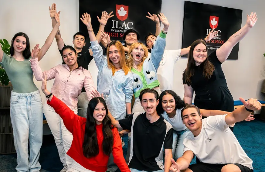 stundents posing for a photo in classroom